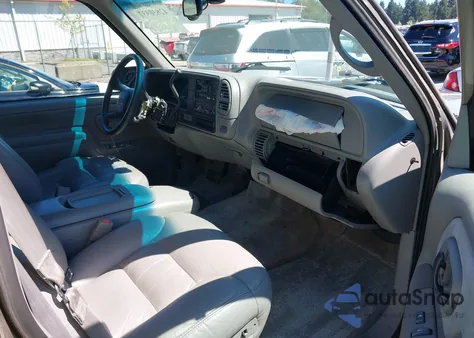 1999 Chevrolet Tahoe Ls from USA, damaged, VIN 1GNEK13R8XR101882